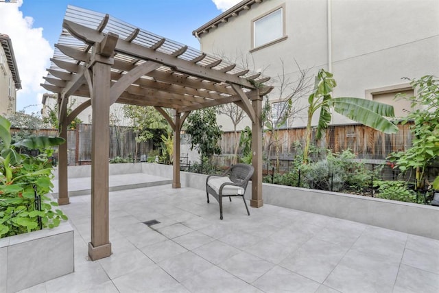 view of patio featuring a pergola