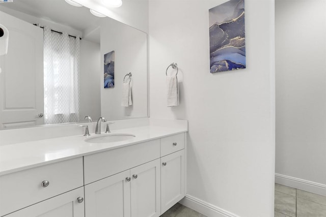 bathroom with vanity and tile patterned floors