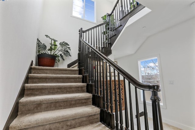 stairway with a high ceiling