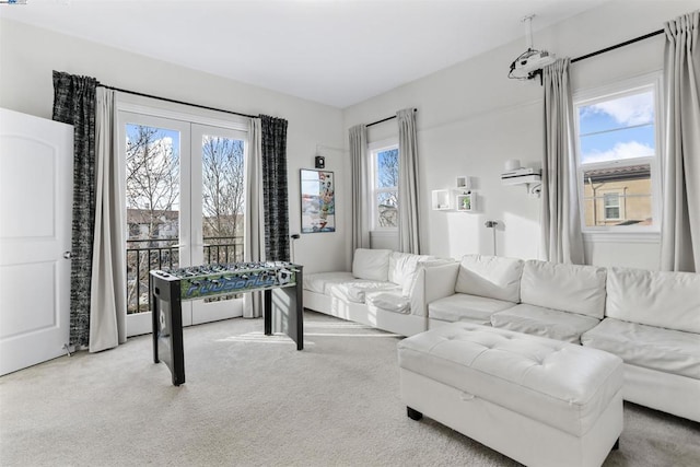 carpeted living room featuring a wealth of natural light