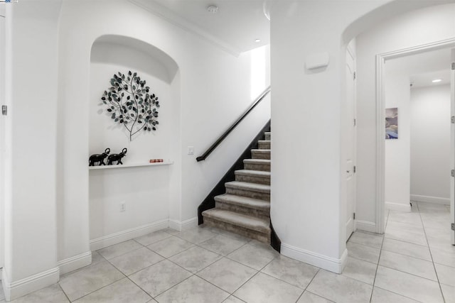 staircase with tile patterned flooring