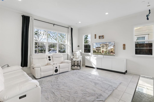 living room with ornamental molding and light tile patterned floors