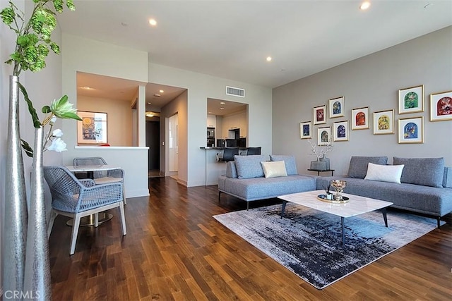 living room with dark wood-type flooring