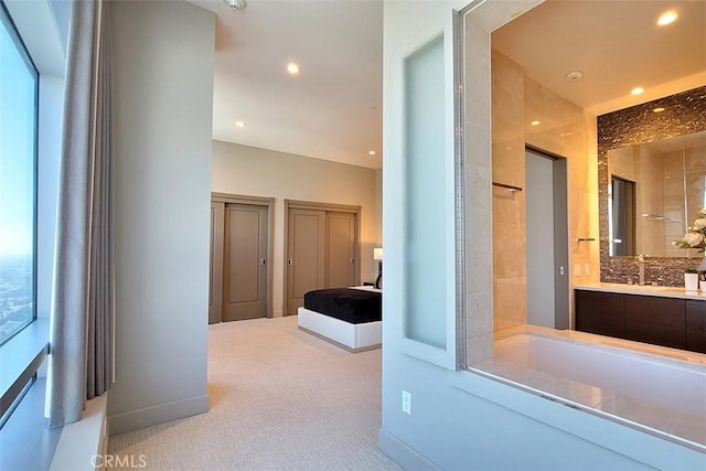 bathroom with vanity and backsplash