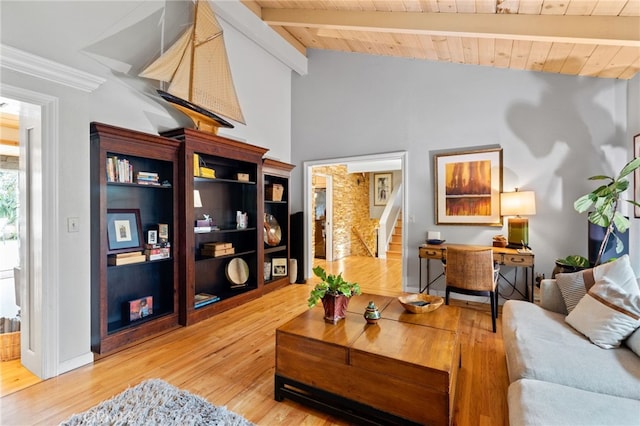 living room featuring vaulted ceiling with beams, wood ceiling, and wood-type flooring