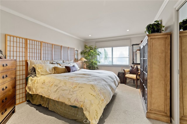 bedroom with recessed lighting, crown molding, and light colored carpet