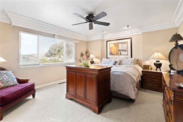 bedroom with light carpet, a ceiling fan, baseboards, and ornamental molding