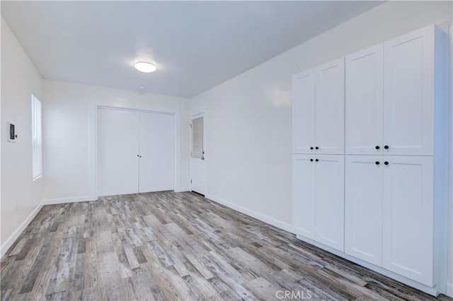 121/2 25th Pl, Venice, CA 90291 - unfurnished bedroom featuring wood finished floors and baseboards