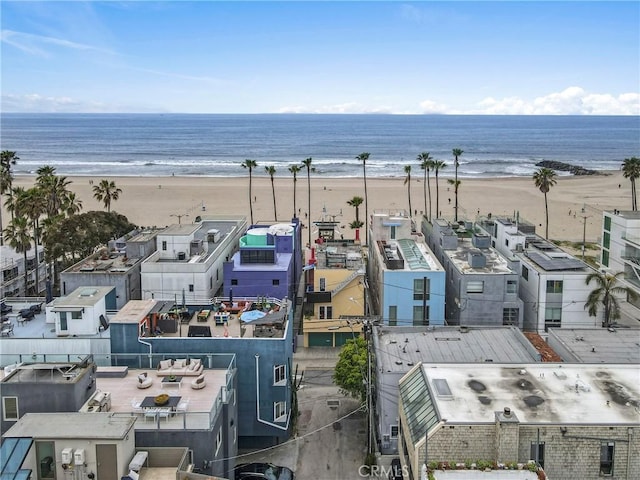 bird's eye view featuring a water view and a view of the beach