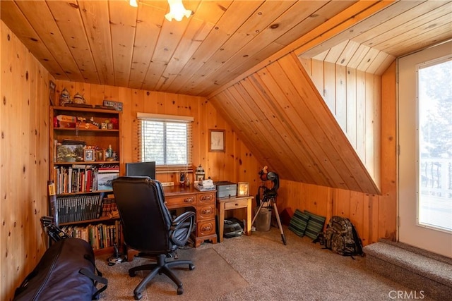 home office with wood ceiling, carpet flooring, and wooden walls