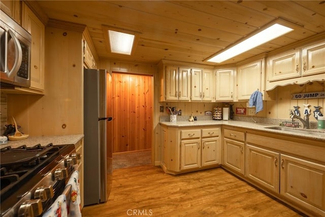 kitchen with sink, wood ceiling, stainless steel appliances, light brown cabinetry, and light wood-type flooring