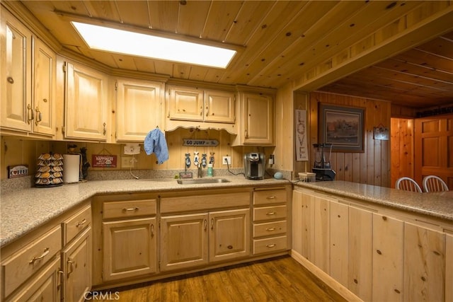 kitchen featuring sink, wood ceiling, light hardwood / wood-style flooring, and light brown cabinets