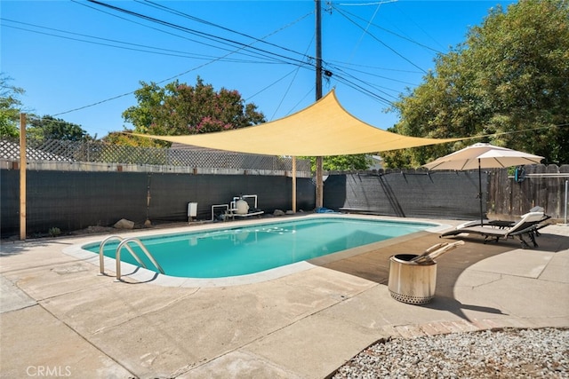 view of pool featuring a patio area