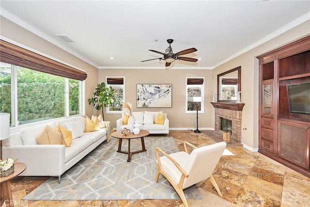 living room featuring a brick fireplace, ornamental molding, and ceiling fan