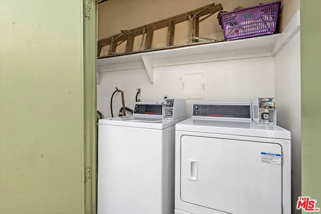 washroom featuring separate washer and dryer