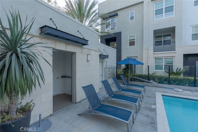 view of patio with a community pool