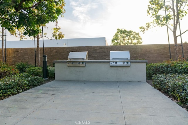 view of patio featuring a grill and area for grilling