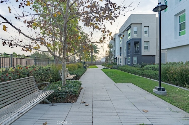 view of home's community with a lawn