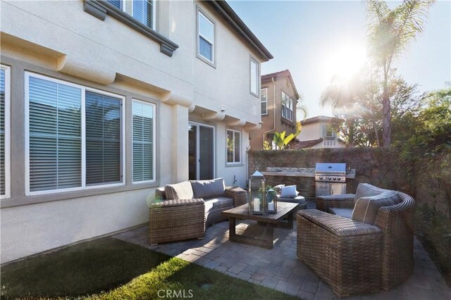 view of patio featuring outdoor lounge area and area for grilling