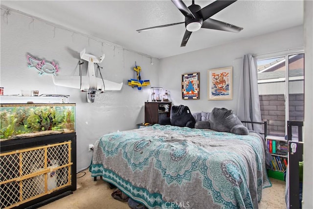 carpeted bedroom featuring ceiling fan