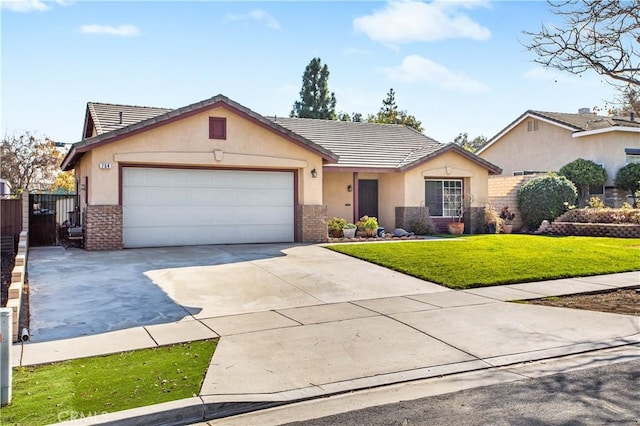 ranch-style home featuring a garage and a front lawn