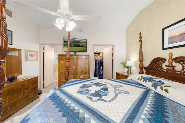 bedroom with a spacious closet, a closet, and ceiling fan