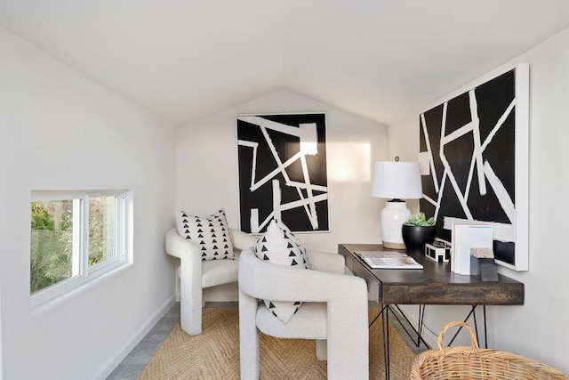 office area featuring lofted ceiling