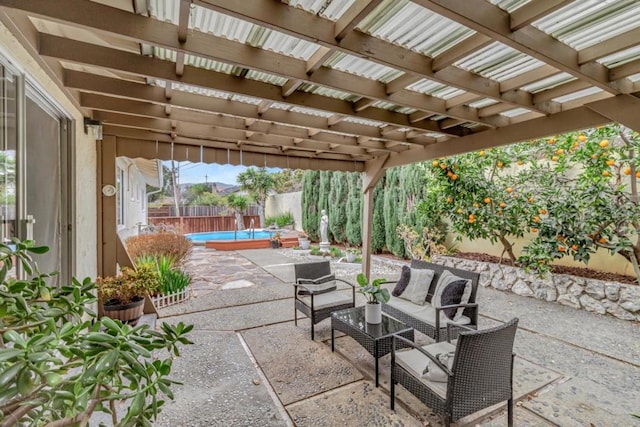 view of patio featuring a pergola, an outdoor hangout area, and a fenced in pool