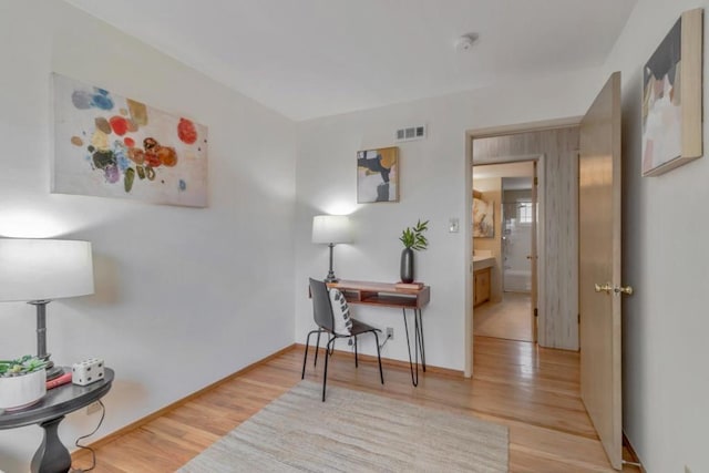 home office featuring light hardwood / wood-style flooring