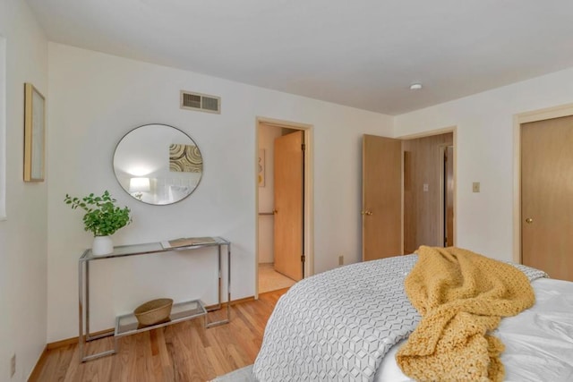 bedroom featuring light wood-type flooring