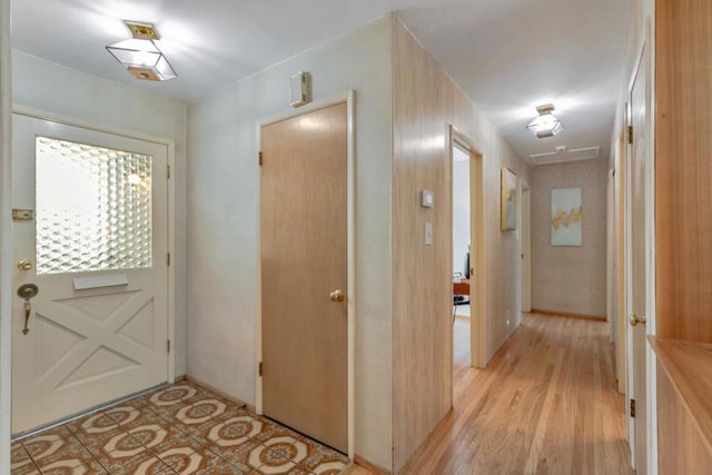 doorway to outside featuring light hardwood / wood-style floors