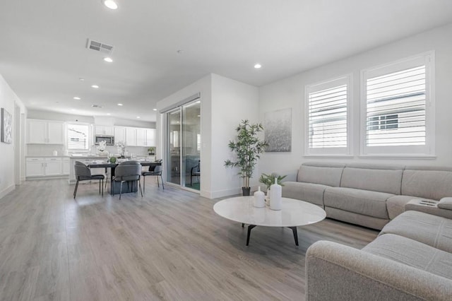 living room with light wood-type flooring