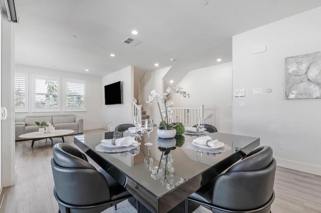 dining room with light hardwood / wood-style floors