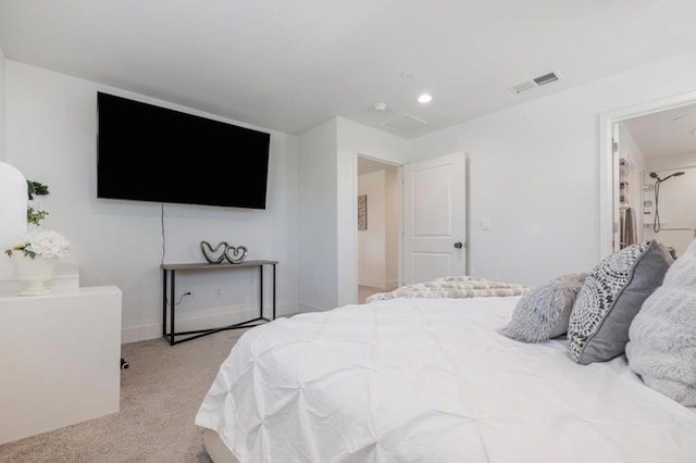 bedroom with light carpet