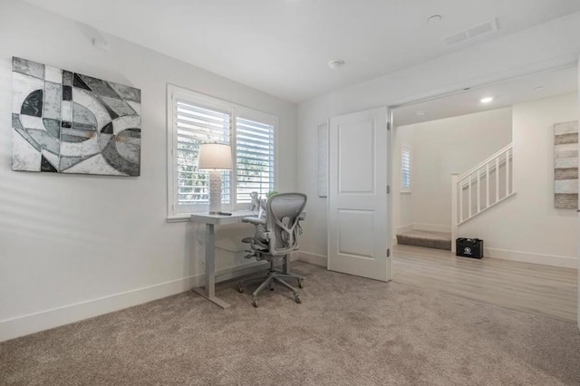 view of carpeted home office