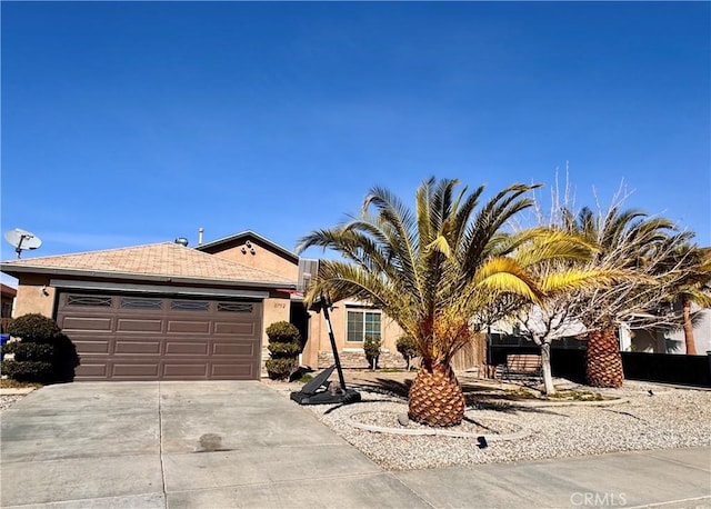 ranch-style home with a garage