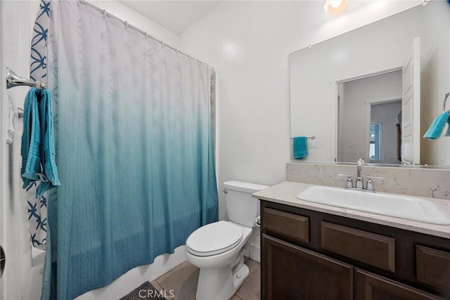 full bathroom with vanity, tile patterned floors, toilet, and shower / bathtub combination with curtain