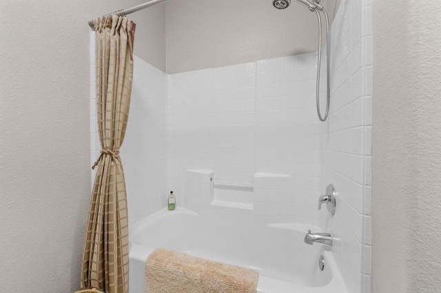 bathroom featuring shower / bath combination with curtain