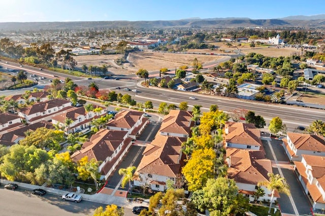 drone / aerial view featuring a mountain view