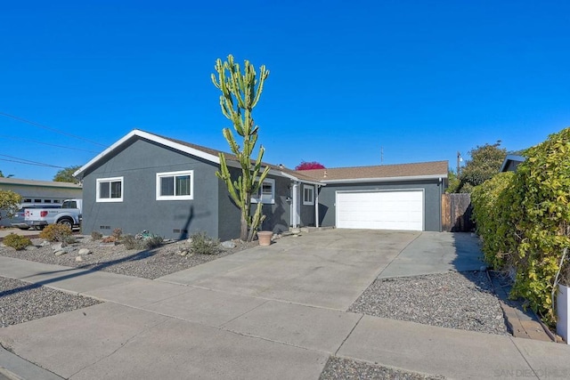 ranch-style home with a garage