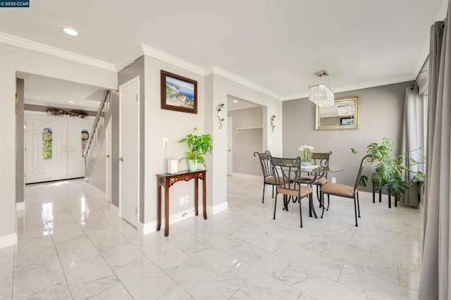 dining room featuring ornamental molding