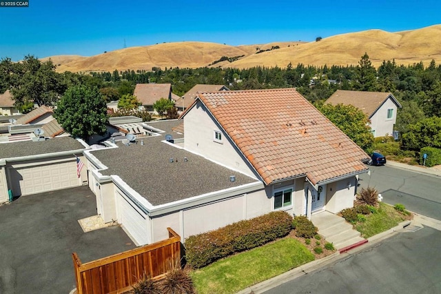 drone / aerial view featuring a mountain view