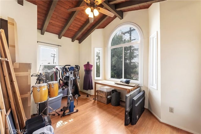 miscellaneous room featuring ceiling fan, wooden ceiling, lofted ceiling with beams, and light wood-type flooring