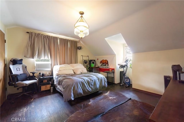 bedroom with cooling unit and lofted ceiling