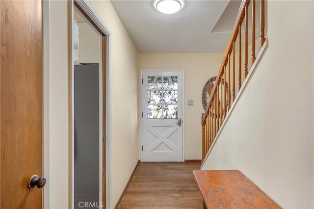 entryway with light hardwood / wood-style floors