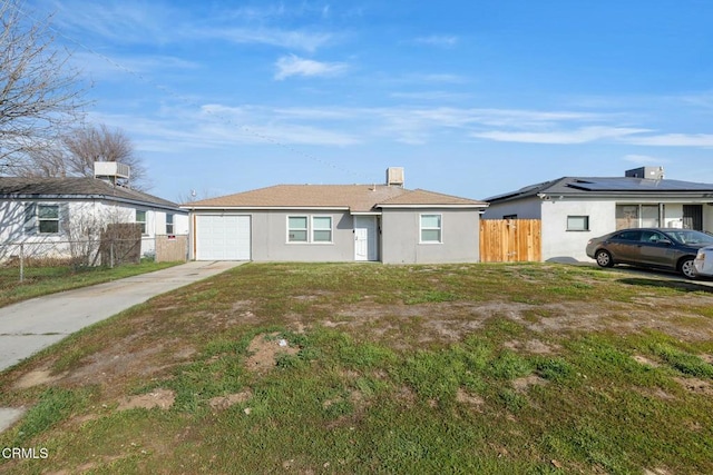 ranch-style home with a garage