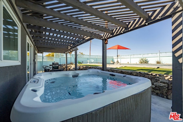 view of patio featuring a pergola and a hot tub