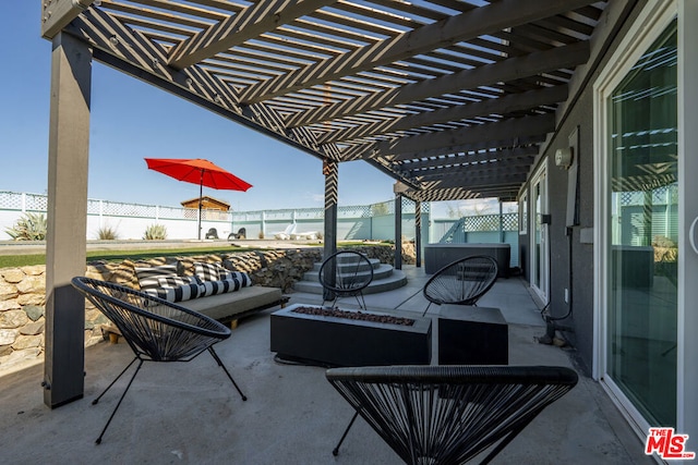 view of patio with a pergola and an outdoor fire pit