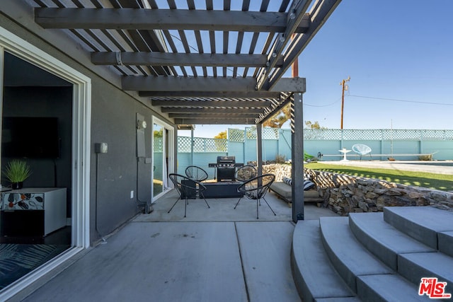 view of patio featuring a pergola