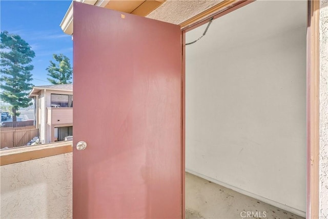 doorway to property with a balcony